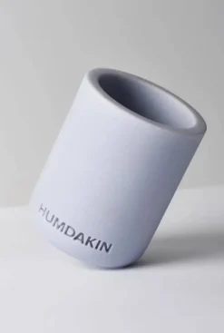 Humdakin tandborstmugg lätt sandsten Blue glass